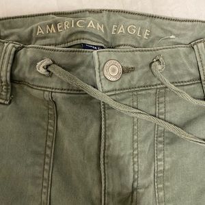 American Eagle army green skinny jeans.